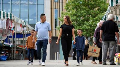 Family walking through South Shields Market